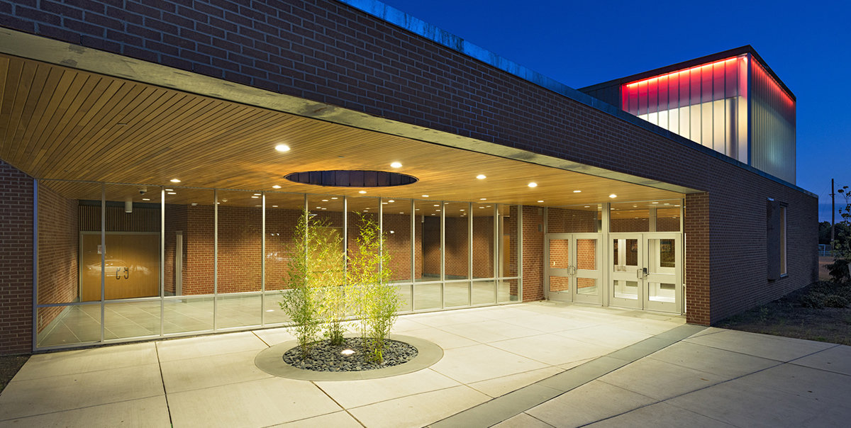 1 tskp fairfield fairfield woods middle school exterior detail night time shot of main entry with lighting 1400 0x72x1200x604 q85