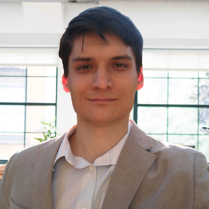 Oleg headshot edit 700 323x361x2478x2477 q85