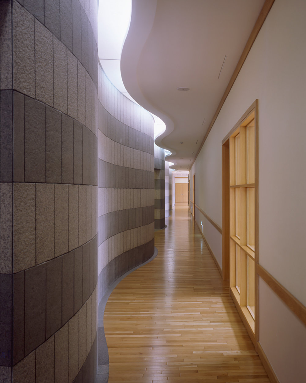 8 tskp kookmin insurance company corporate training center interior detail wavy walls hallway and ceiling design natural lighting 1400 xxx q85